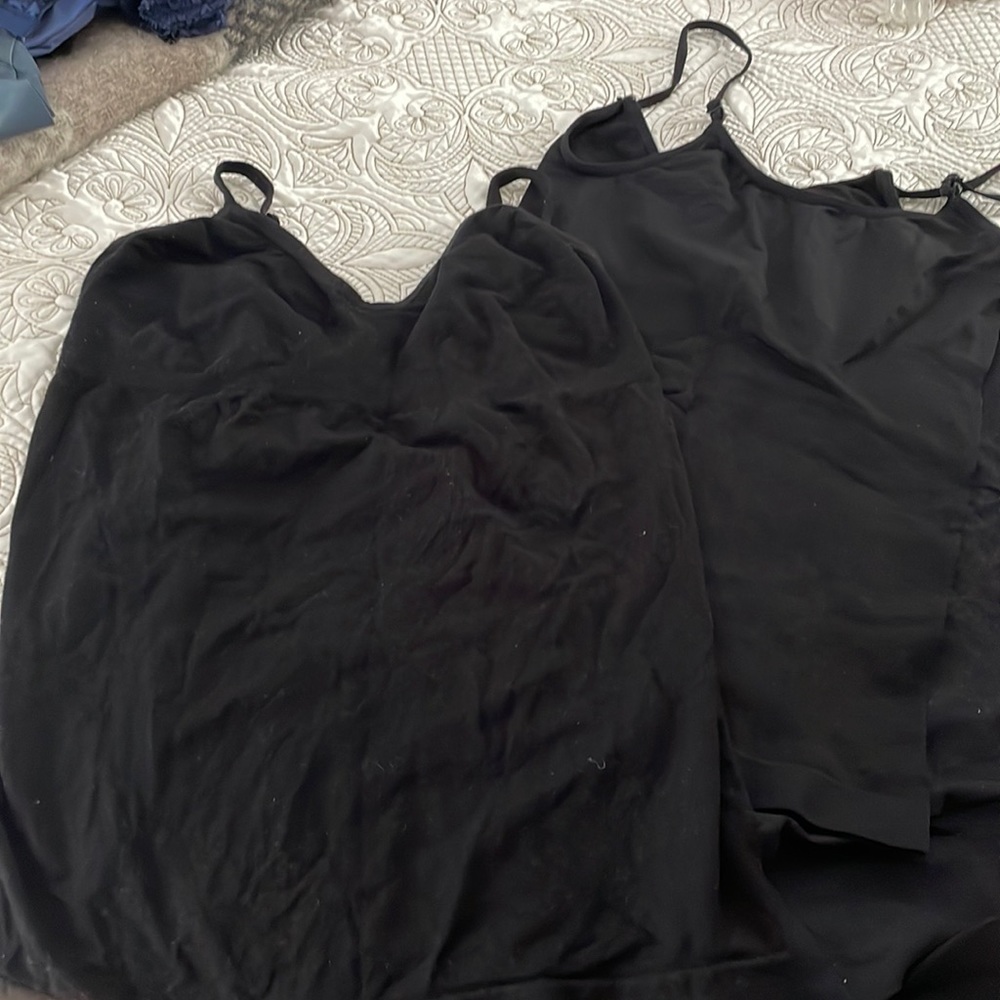 Bundle four medium camisoles one simple bra L but seems much smaller.